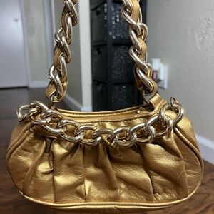 Candie's gold minie bag